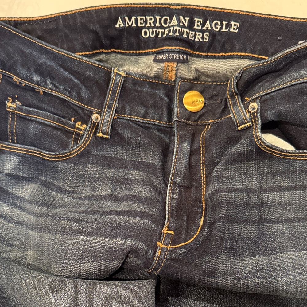 American Eagle Outfitters Dark Wash Super Stretch Jeans with Gold Stitching